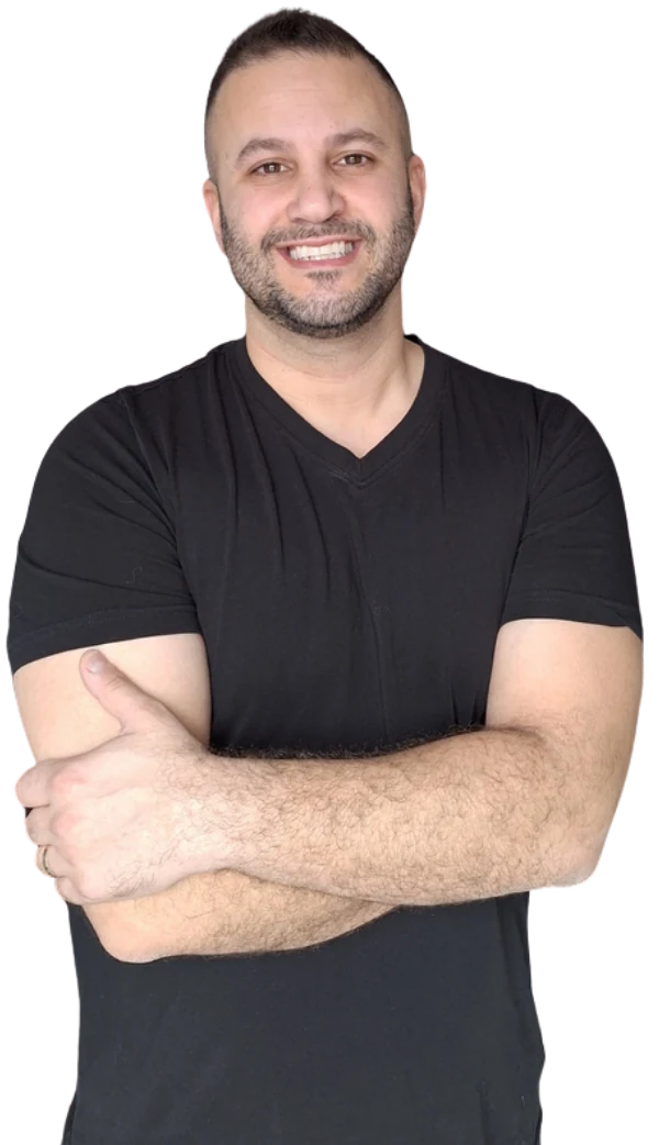 Eddy Bahnam standing with his arms crossed